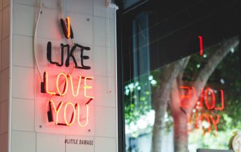 neon-words-in-a-window-with-a-reflection-that-say-2021-08-31-00-11-20-utc (Medium)